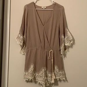 Umgee tan romper. size L